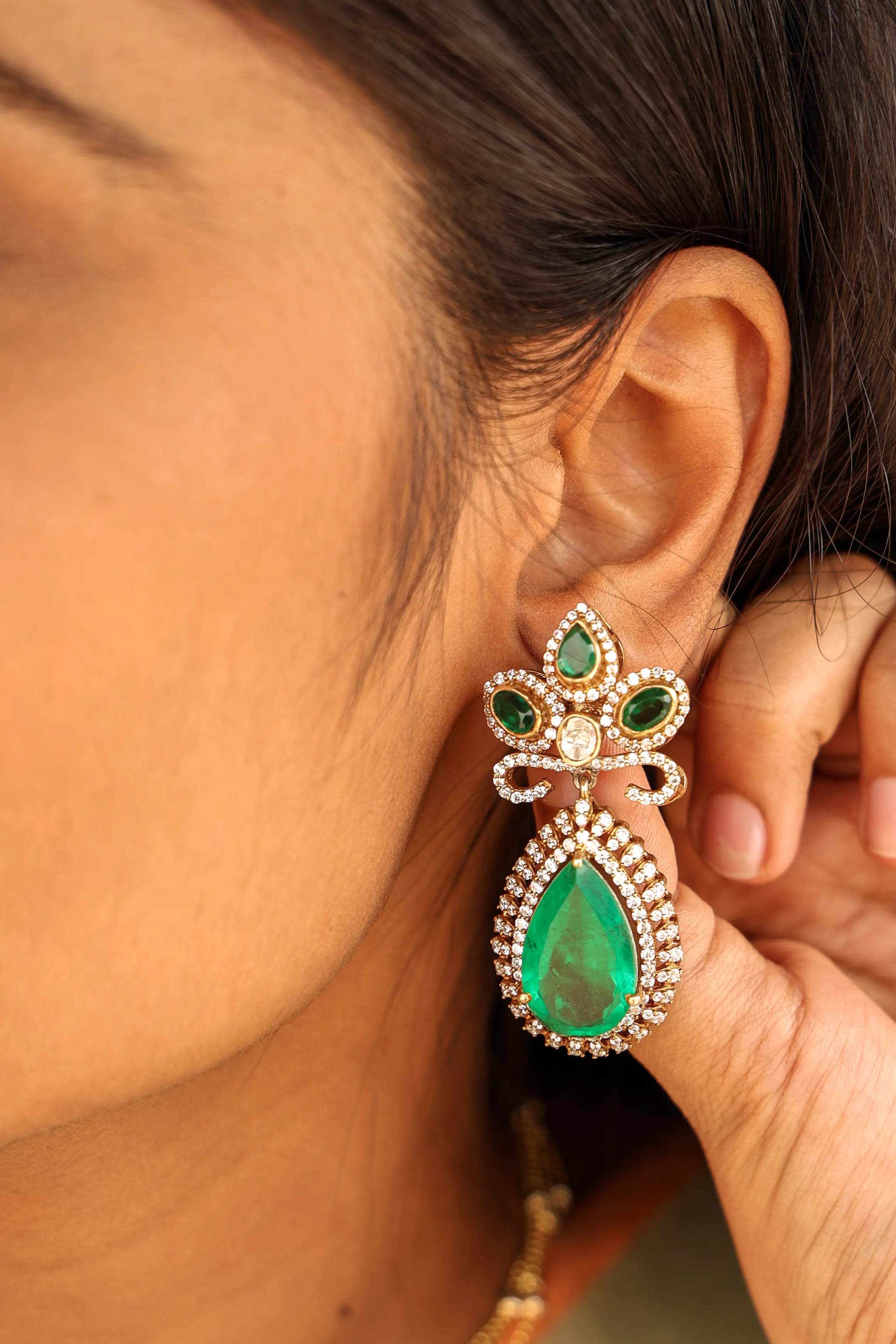 Emerald Radiance Dangler Earrings