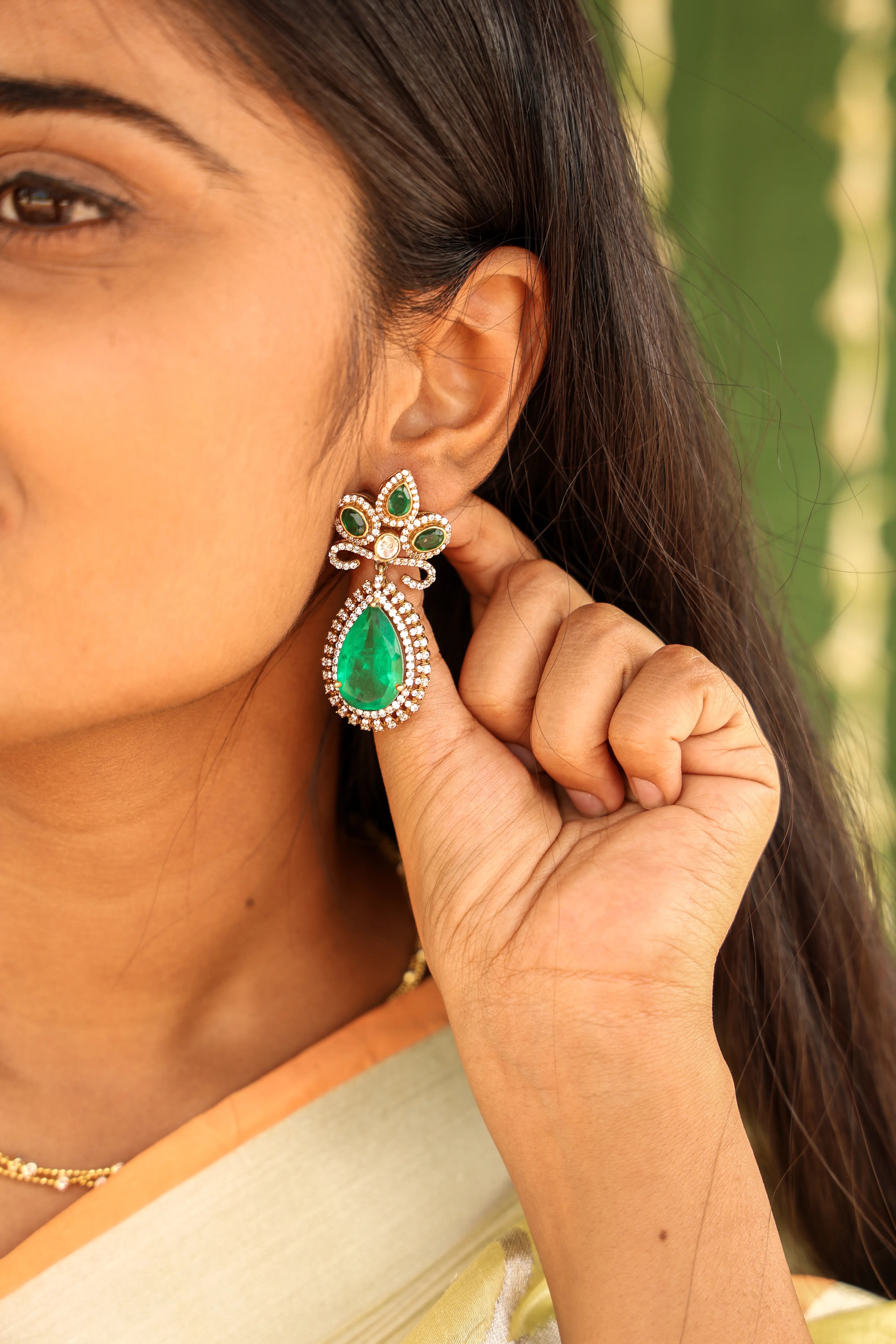 Emerald Radiance Dangler Earrings