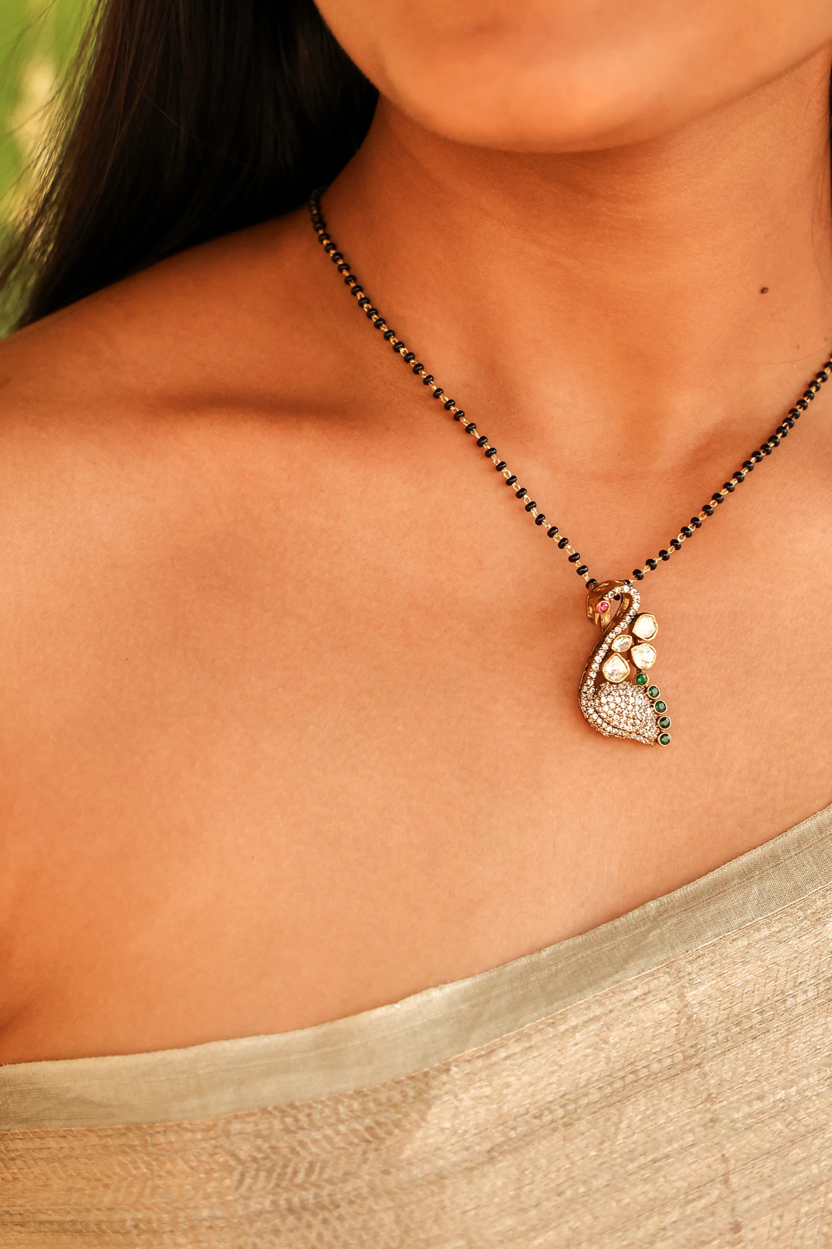 The Regal Peacock Pendant