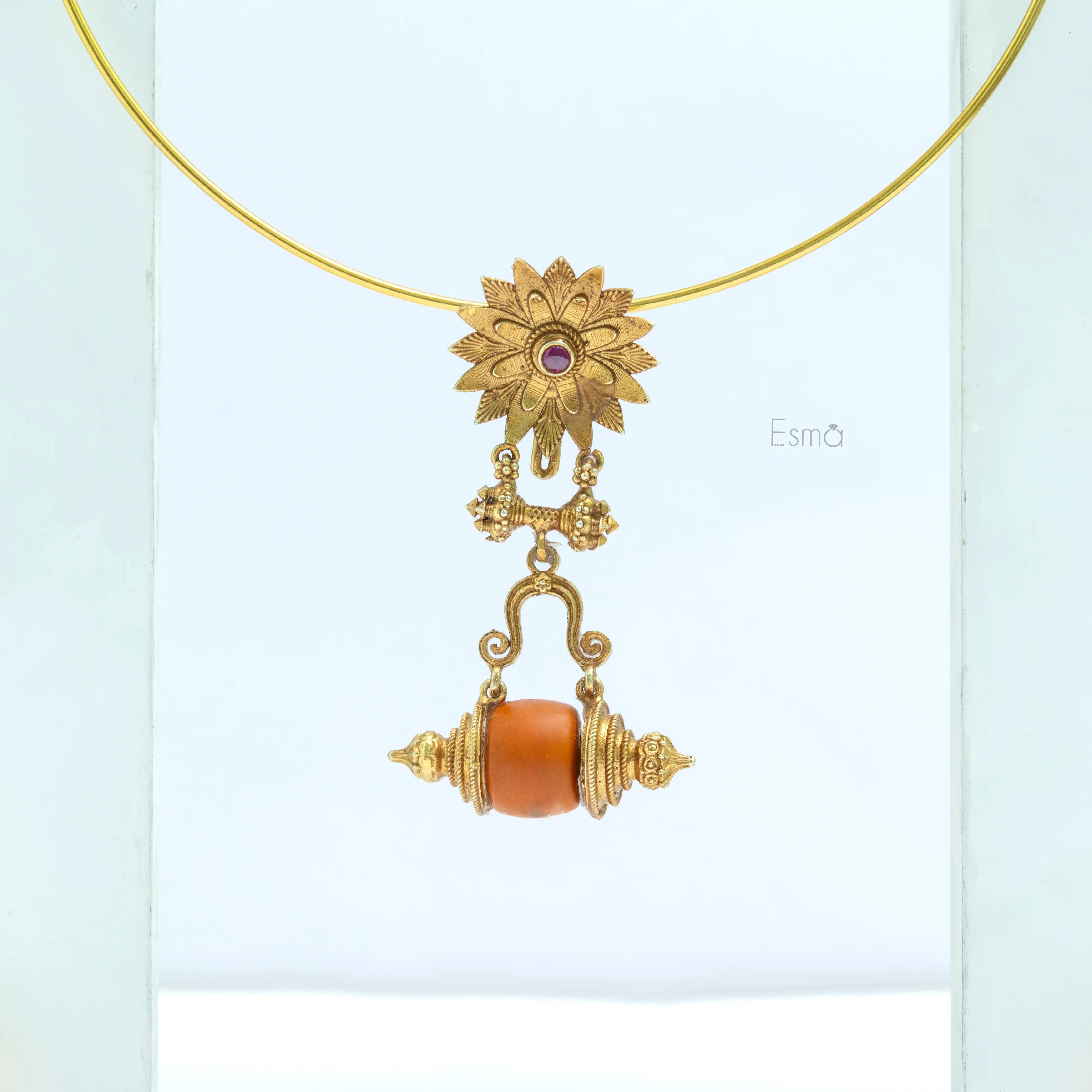 Golden Lotus Coral Temple Pendant
