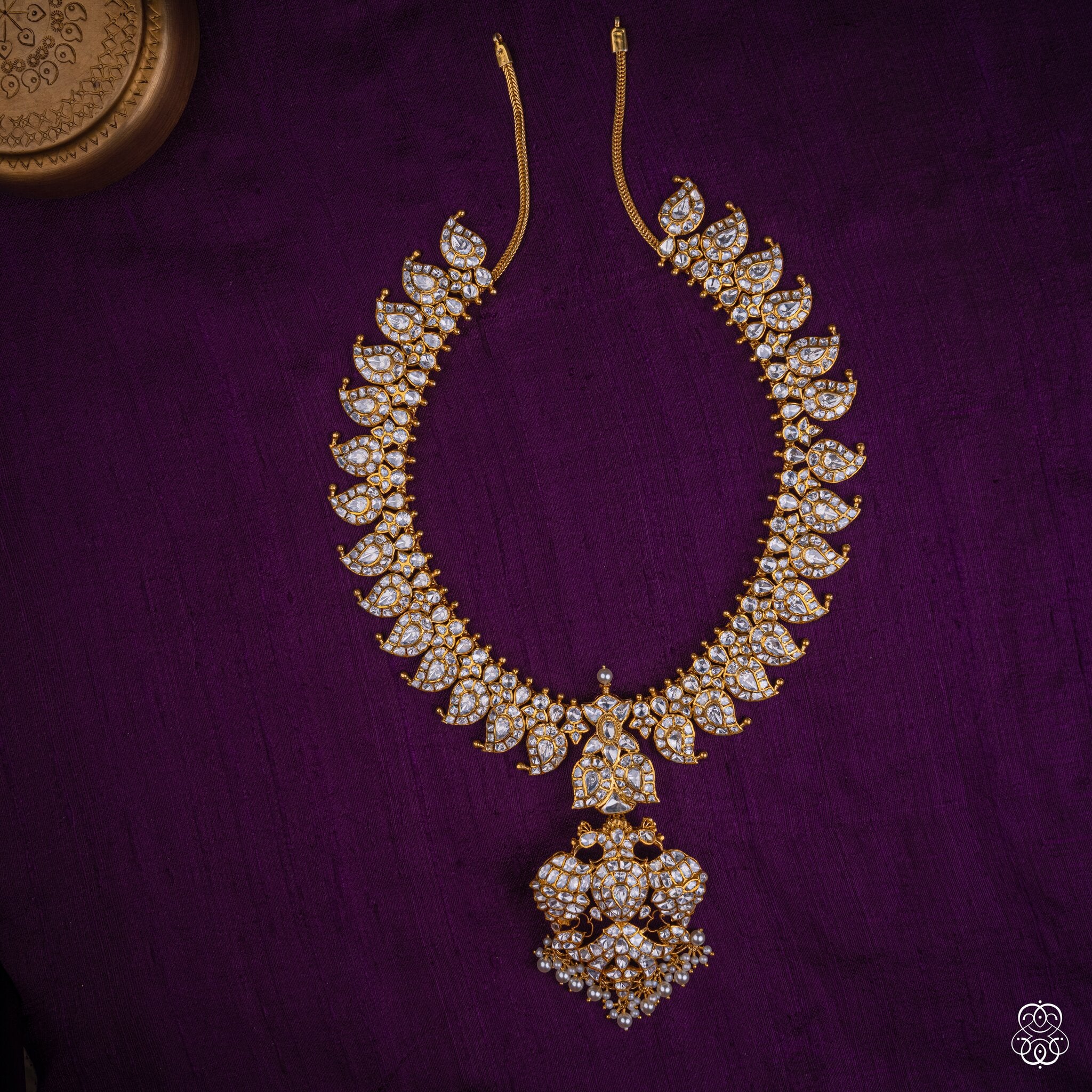 Amravalli Mango Mala kundan necklace with peacock pendant, uncut moissanite and fresh water pearls in 92.5 sterling silver with 22k gold plating