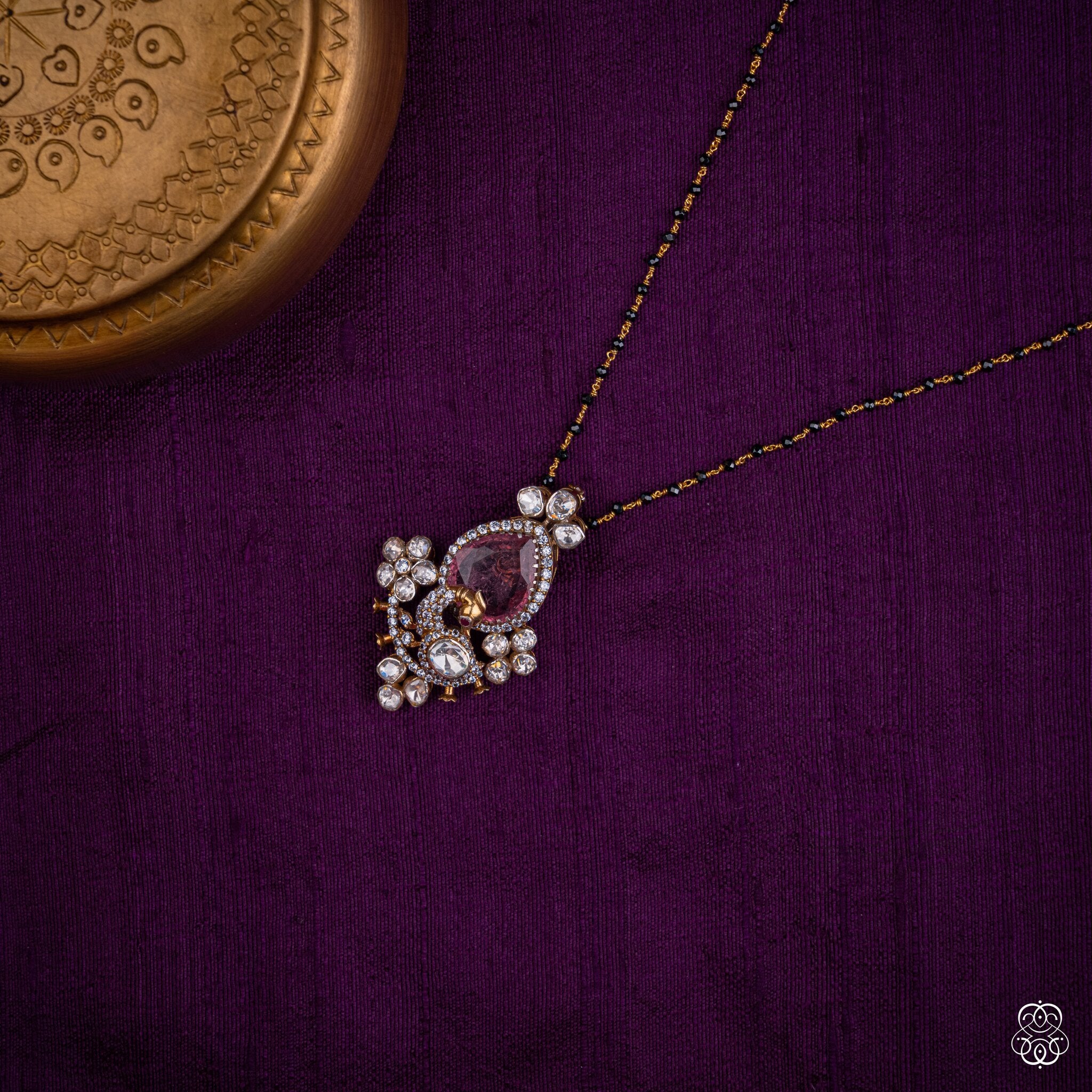 Gulabkali pink tourmaline pendant styled on a black bead chain