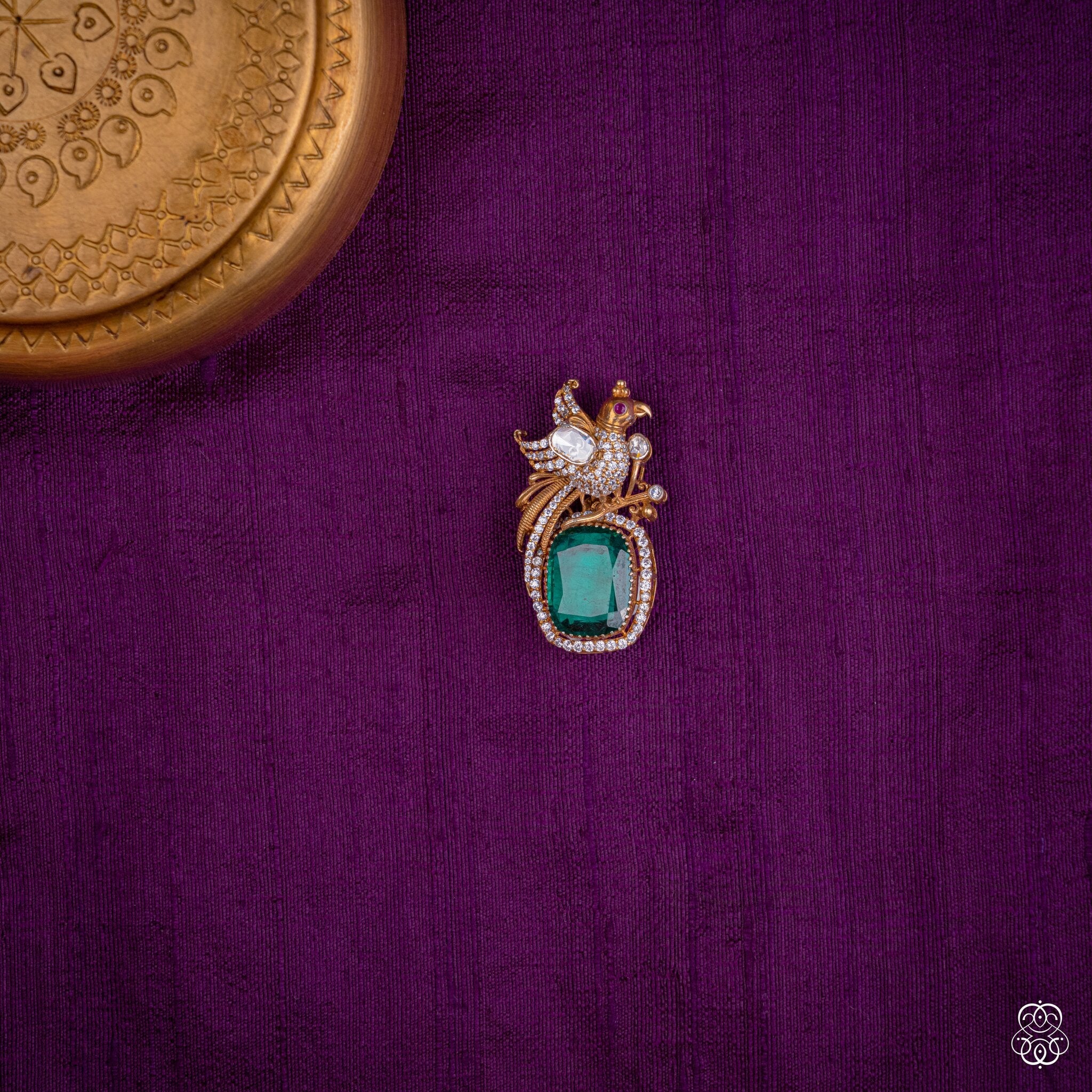Kalapini peacock pendant with a deep green lab-grown emerald and moissanites in 92.5 sterling silver with 22k gold plating
