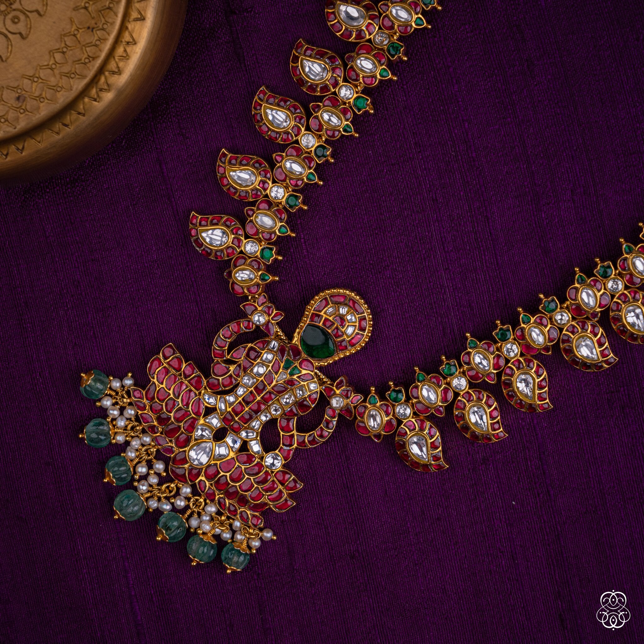 Mayurapriya peacock necklace in ruby, emerald, carved emerald beads and fresh water pearls, 92.5 sterling silver with 22k gold plating