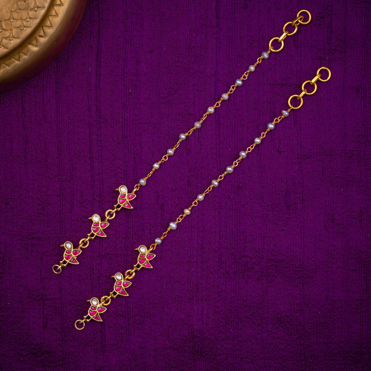 Aamra Matilu - ear chains with mango motifs, set with ruby and white kundan and fresh water pearls, in 92.5 sterling silver with 22k gold plating