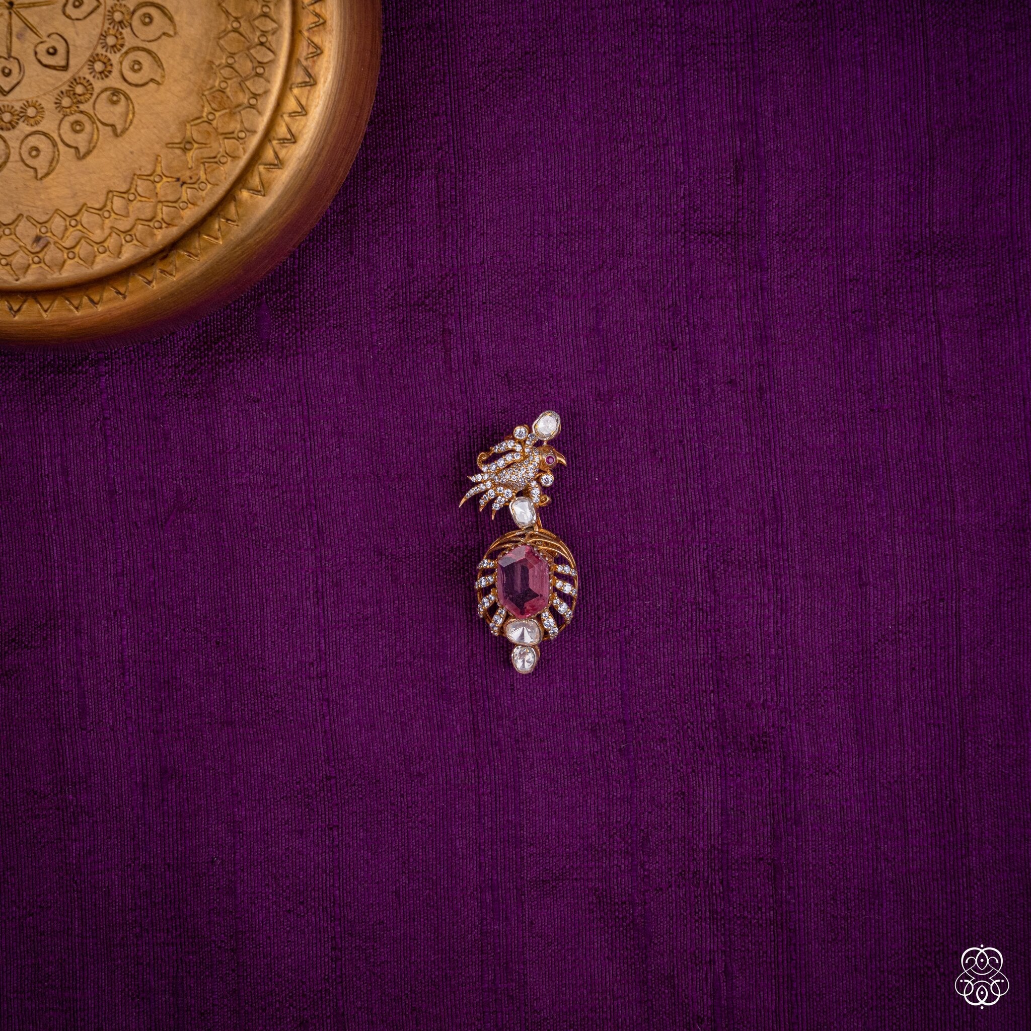 Aruna Pushpa pendant with a pink lab-grown tourmaline oval caged in gold and moissanites, 92.5 sterling silver with 22k gold plating