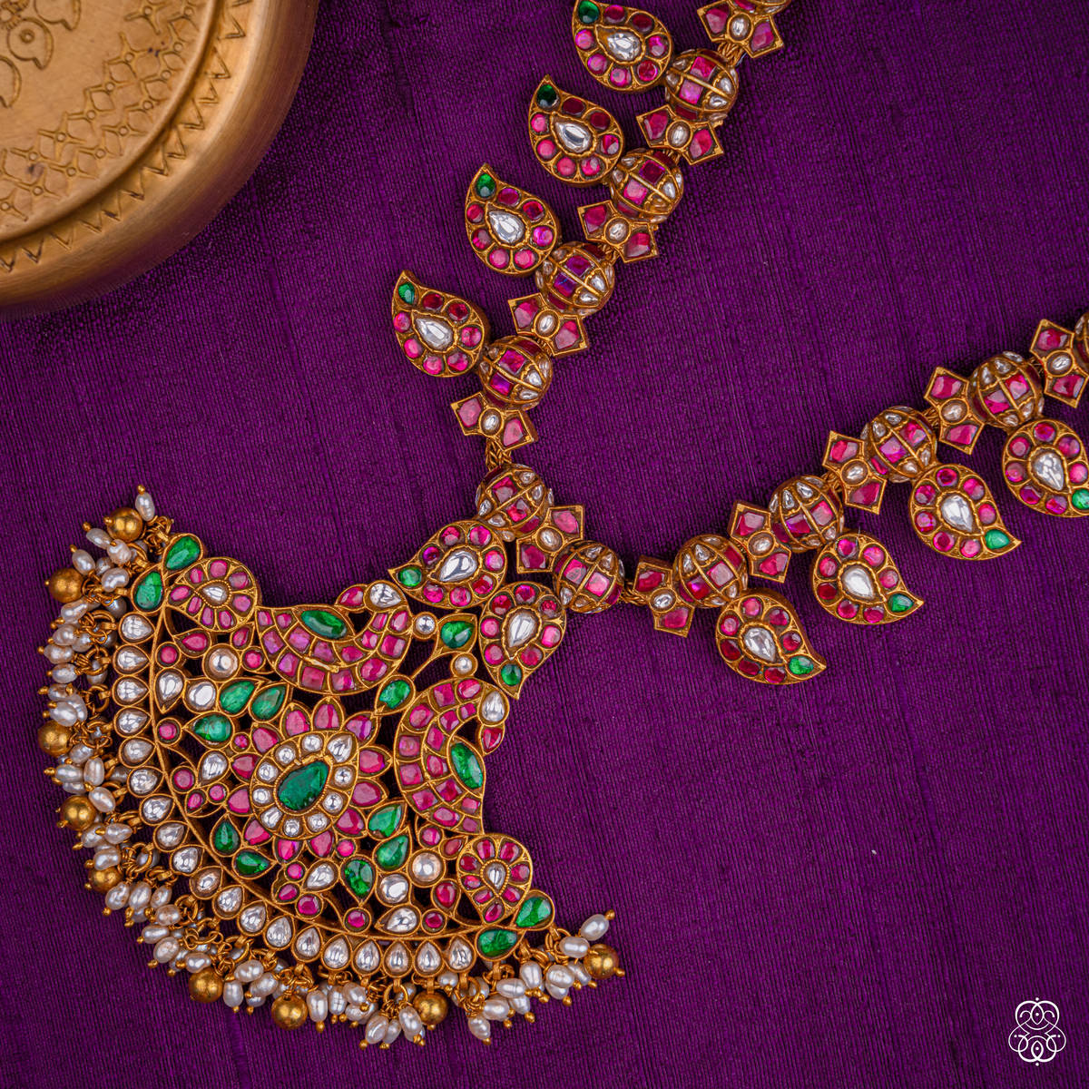 Close-up of the Ratnamayi mango haaram paisley pendant with pearl fringe in 92.5 sterling silver with 22k gold plating