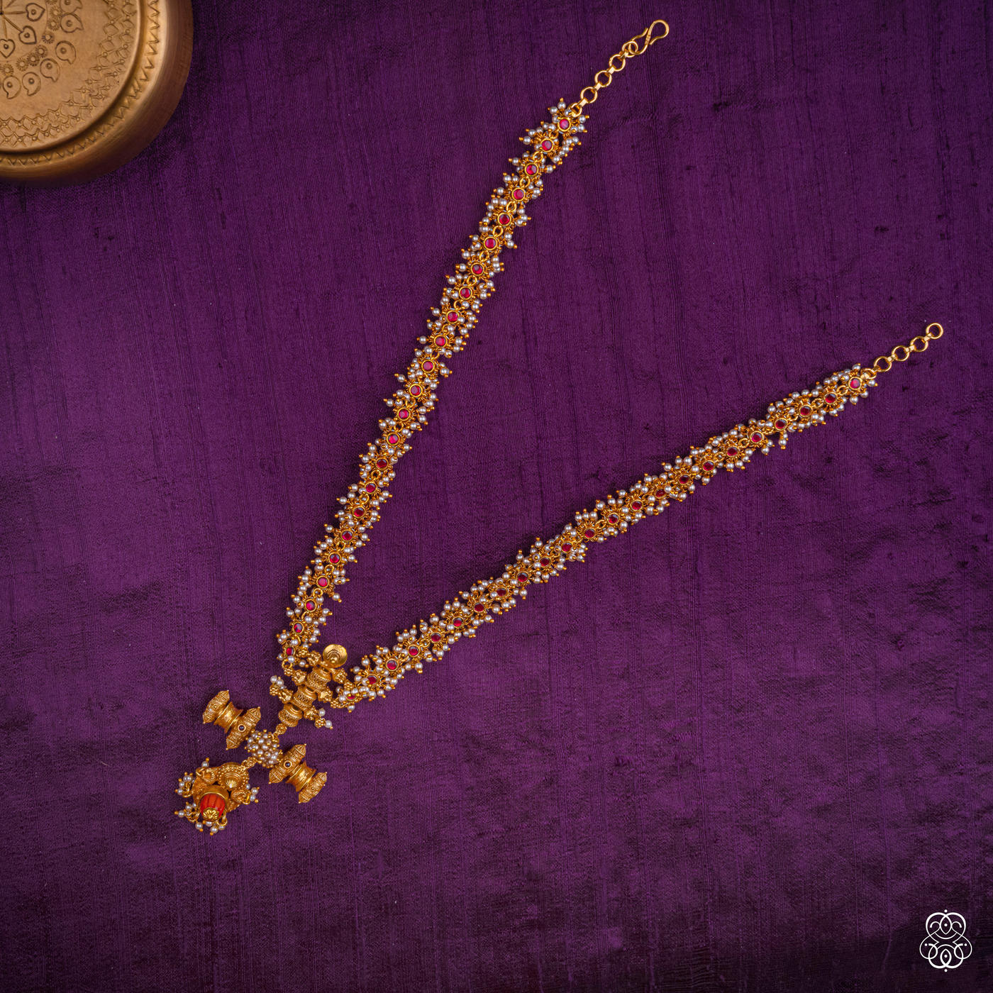 Rukmavati long antique haaram in fresh water pearls and ruby with a drum pendant, 92.5 sterling silver with 22k gold plating