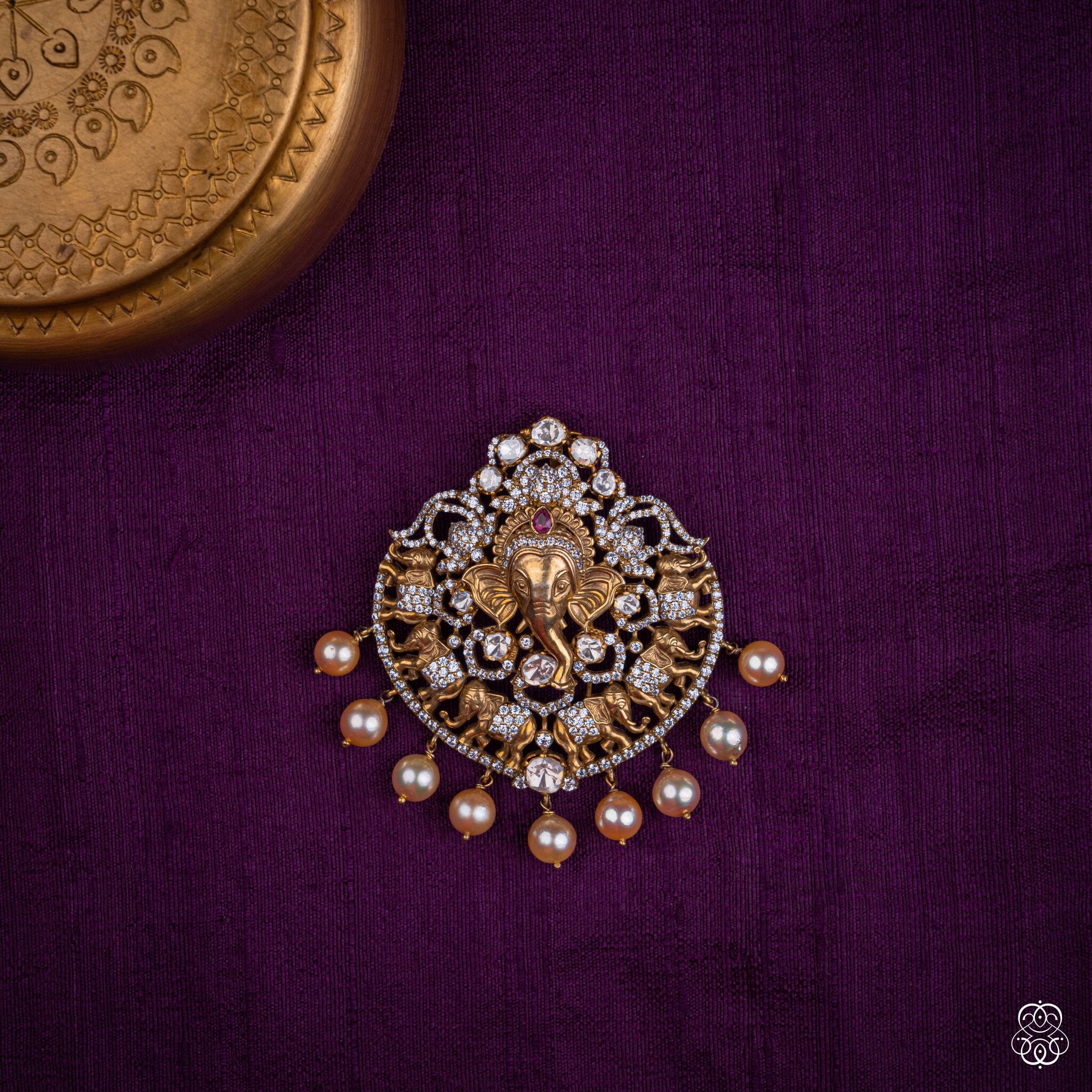 Ekadanta Ganesha pendant with moissanites and freshwater pearls in 92.5 sterling silver with 22k gold plating
