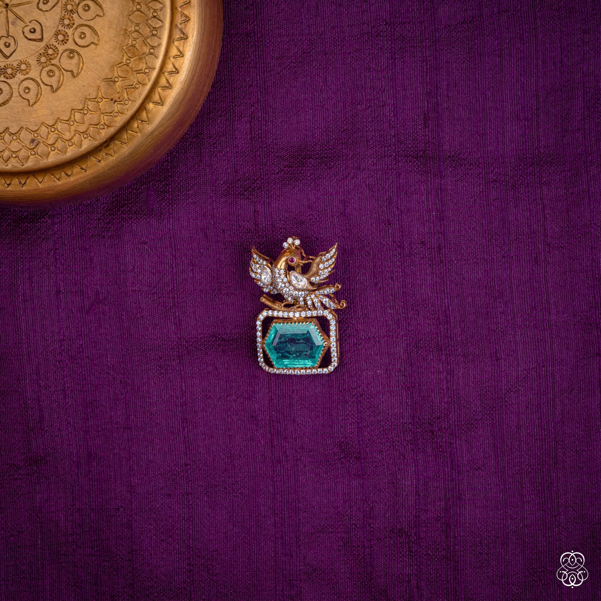 Hamsayugma twin swan pendant with a hexagonal lab-grown emerald and moissanites in 92.5 sterling silver with 22k gold plating