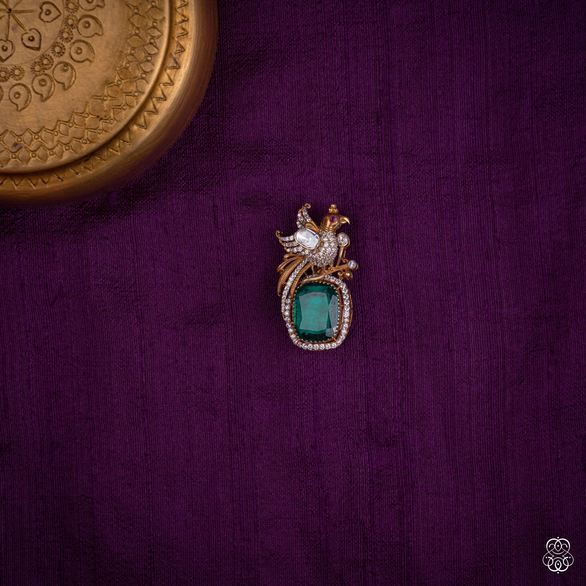 Kalapini peacock pendant with a deep green lab-grown emerald and moissanites in 92.5 sterling silver with 22k gold plating