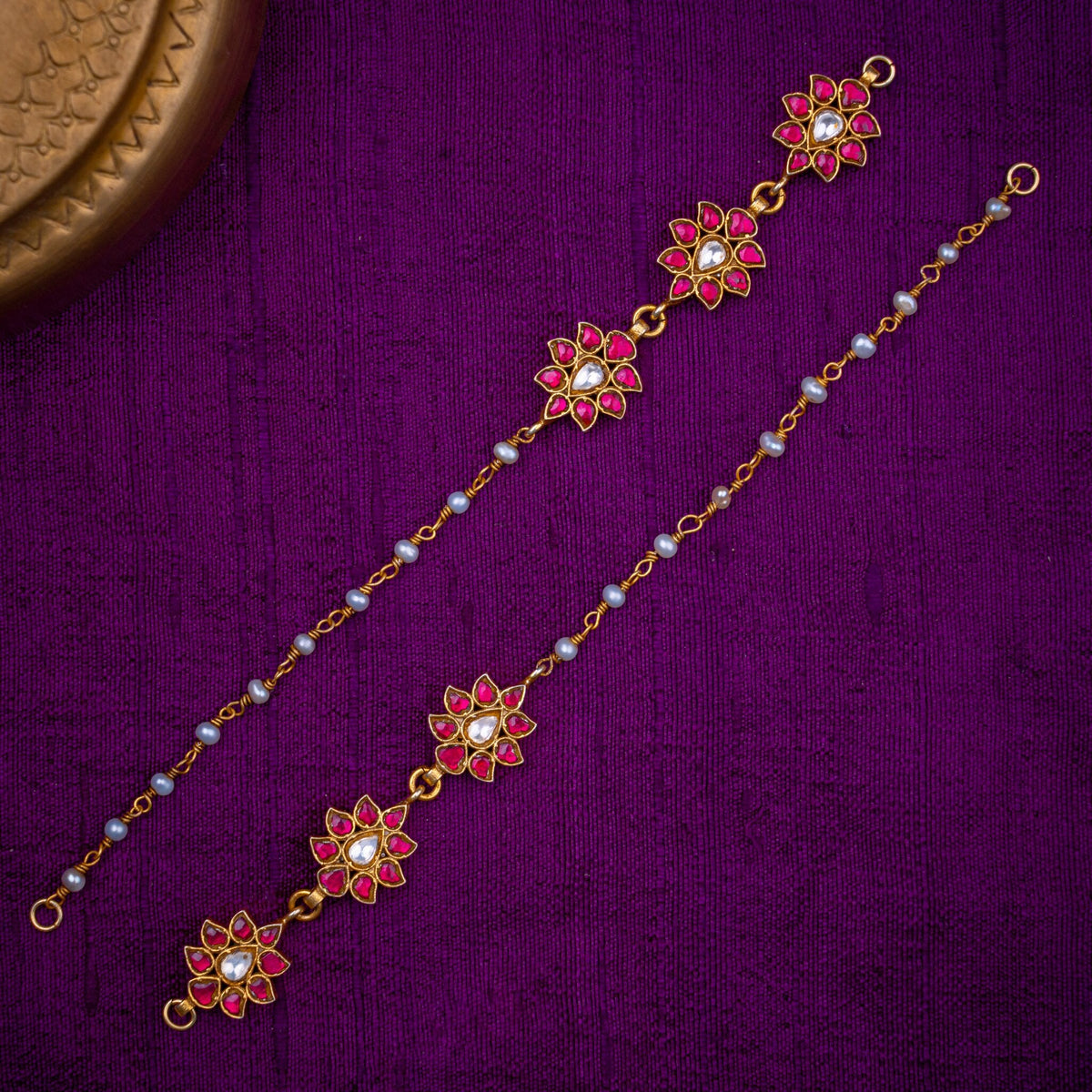 Kamalika Matilu - floral ear chains, set with ruby and white kundan and fresh water pearls, in 92.5 sterling silver with 22k gold plating