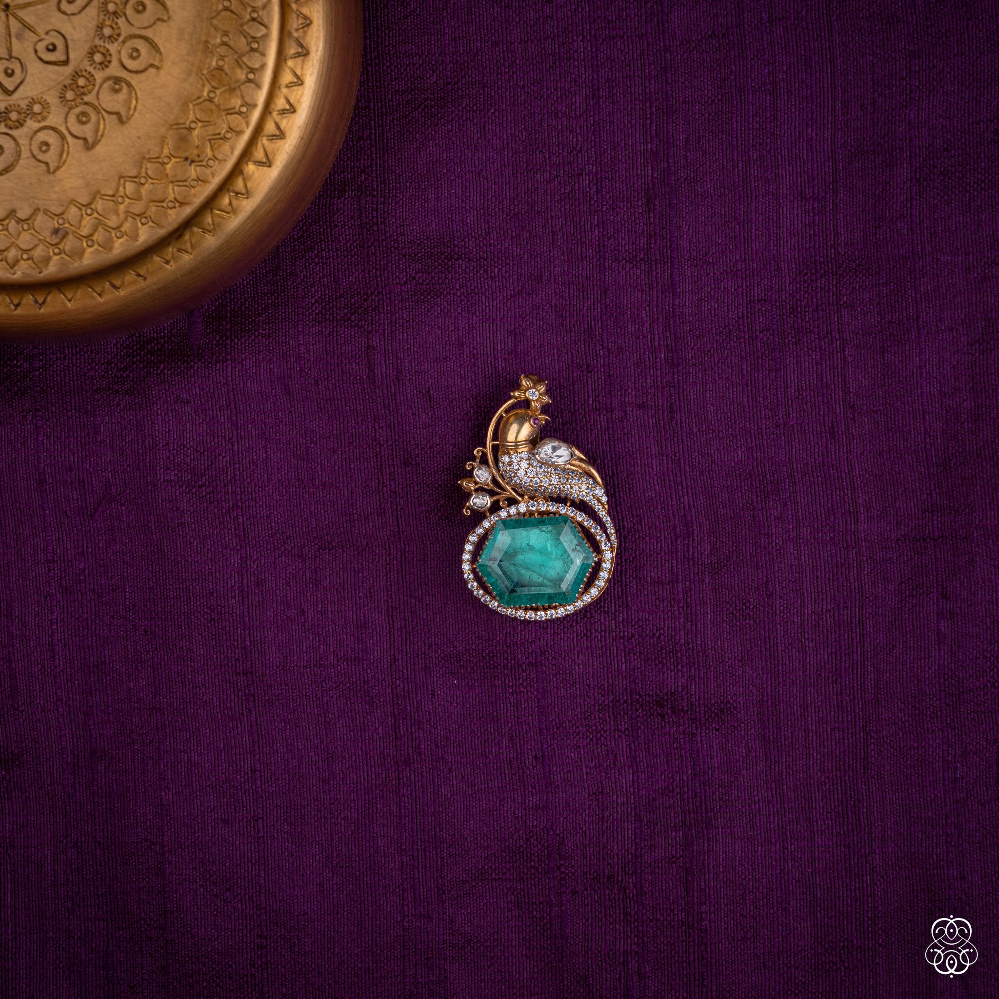 Kekavali peacock pendant with a hexagonal lab-grown emerald and moissanites in 92.5 sterling silver with 22k gold plating