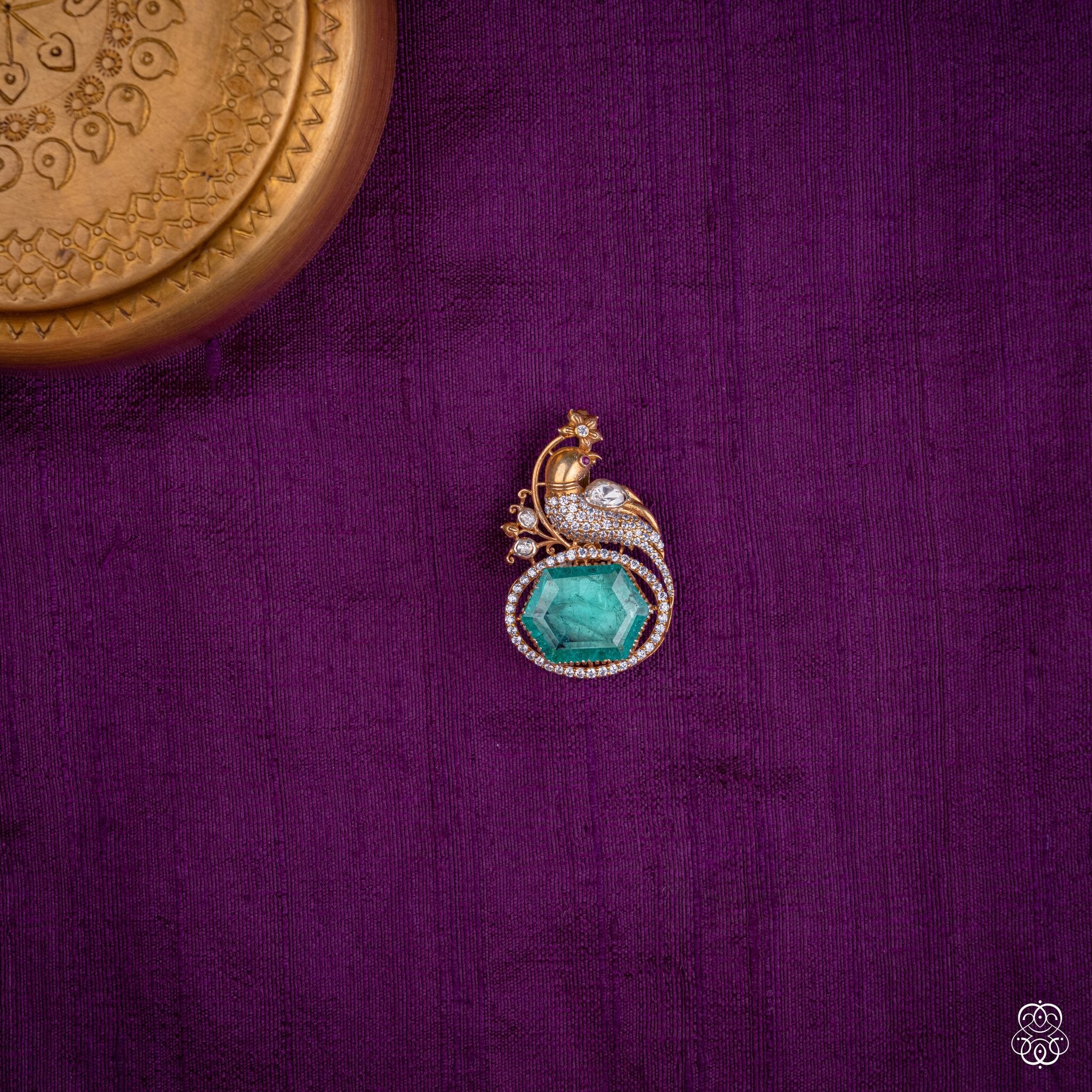 Kekavali peacock pendant with a hexagonal lab-grown emerald and moissanites in 92.5 sterling silver with 22k gold plating
