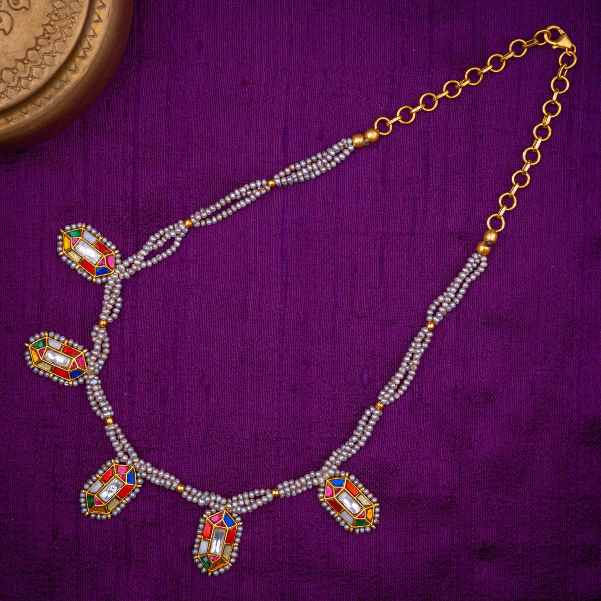 Navarangi Pearl Necklace - multi-strand pearl necklace with navaratna motifs, set with navaratna and white kundan and fresh water pearls, in 92.5 sterling silver with 22k gold plating