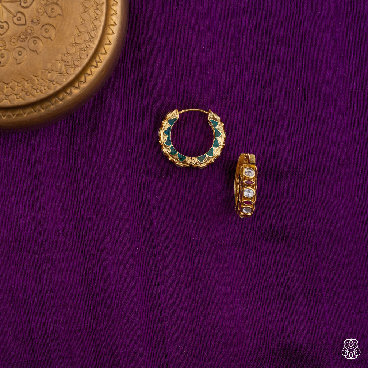Close view of the teal enamel and white kundan on the Neelpankh round bali earrings